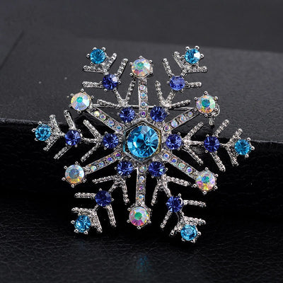 PWO Fitness Christmas gift snowflake brooch featuring blue rhinestones and silver accents, perfect for festive outfits.