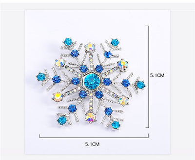 PWO Fitness Christmas gift snowflake brooch featuring blue rhinestones and silver accents, perfect for festive outfits.