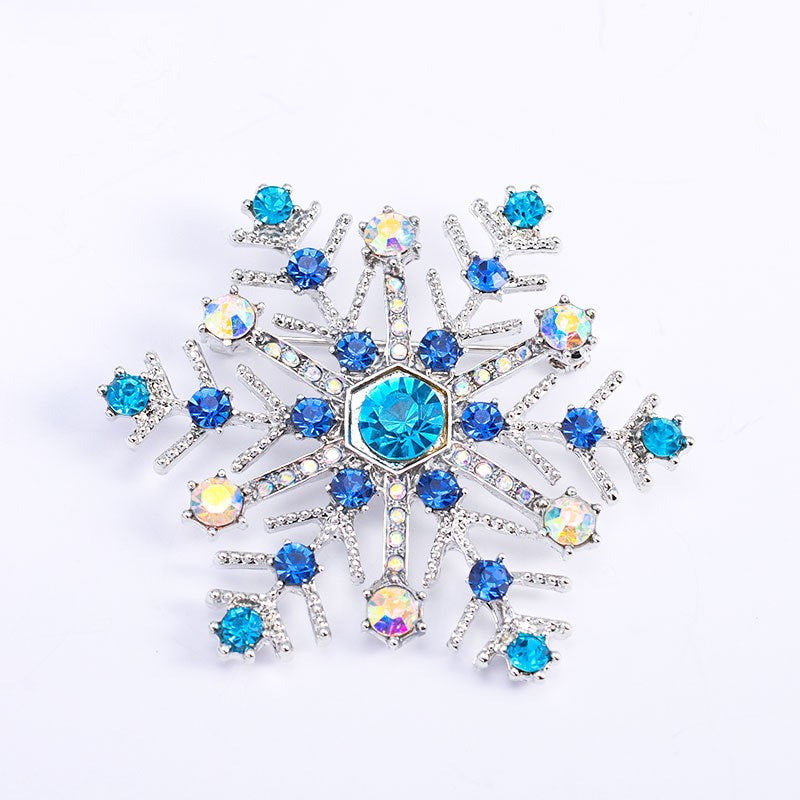 PWO Fitness Christmas gift snowflake brooch featuring blue rhinestones and silver accents, perfect for festive outfits.
